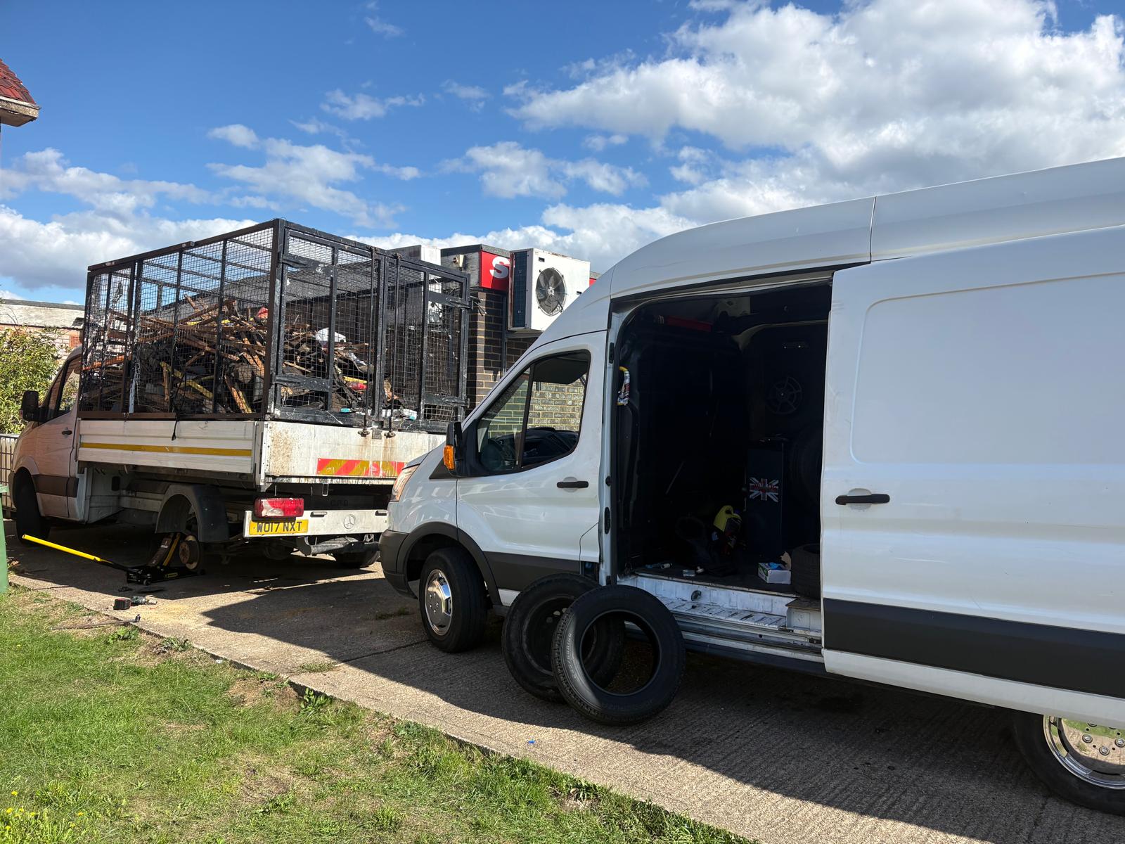 Mercedes caged tipper truck jacked up beside the Mobile Tyre Pros van during a commercial fleet tyre job in Aylesbury